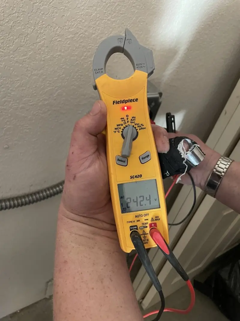 Voltage testing with clamp meter during Generator Installation in Mayfield